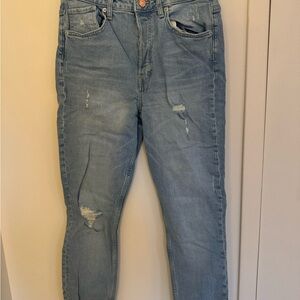 Distressed Light Blue Jeans
